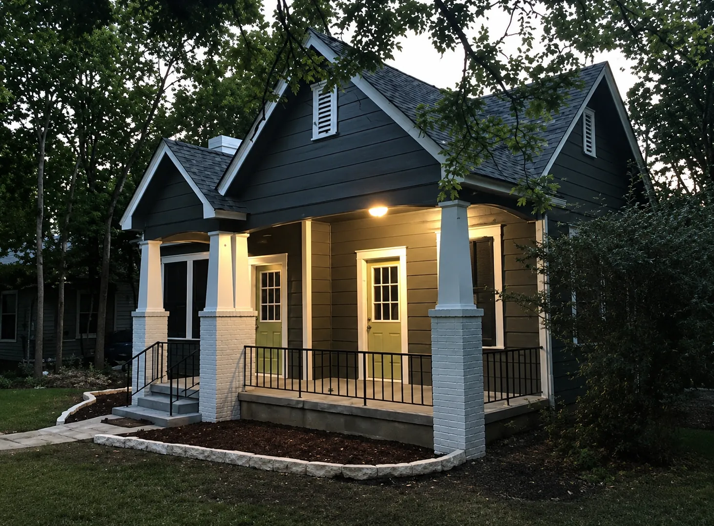 After renovation: refreshed exterior of a two-unit home